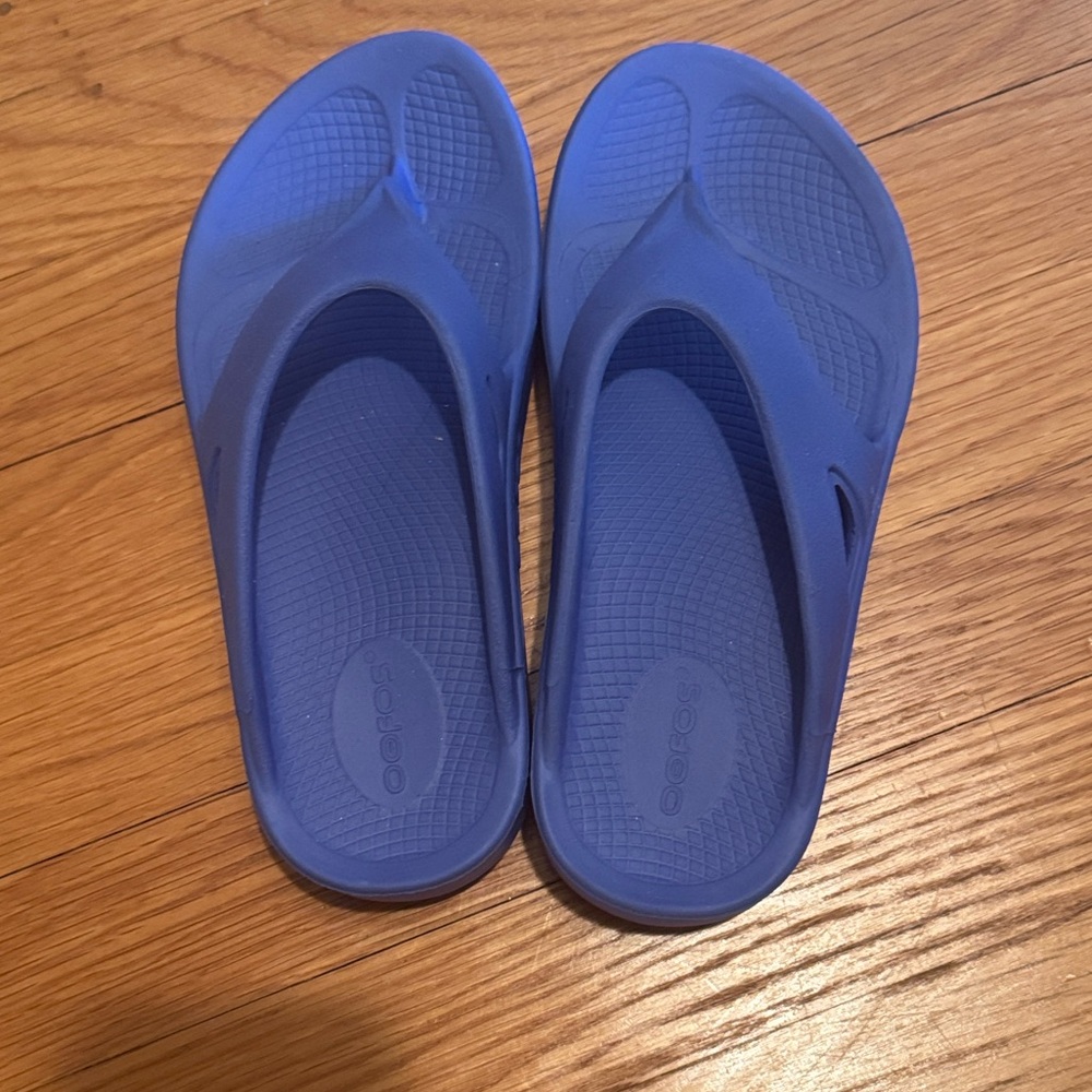 Blue Oofos recovery foam sandals